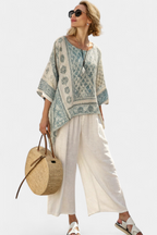 Annalisa – blusa stampata comoda e pantaloni bianchi a gamba larga